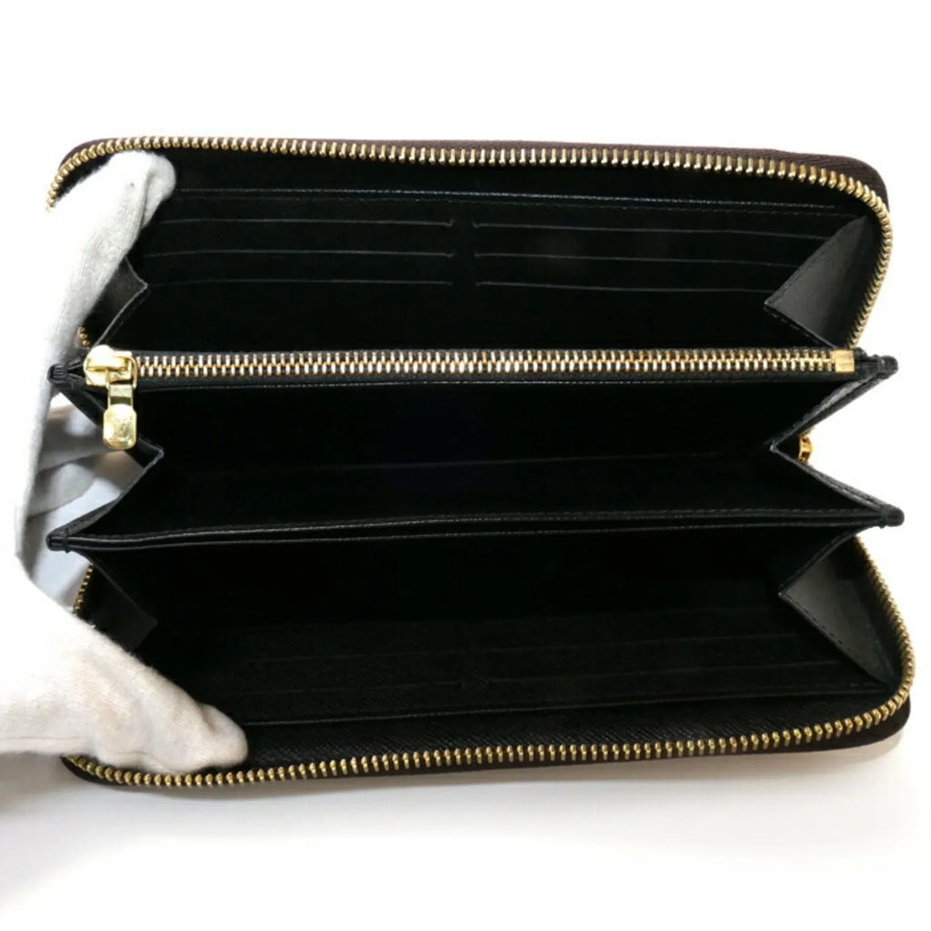 Pre-Owned   Monogram Giant Long Wallet Round Zipper Zippy M69353 Unisex (Good)